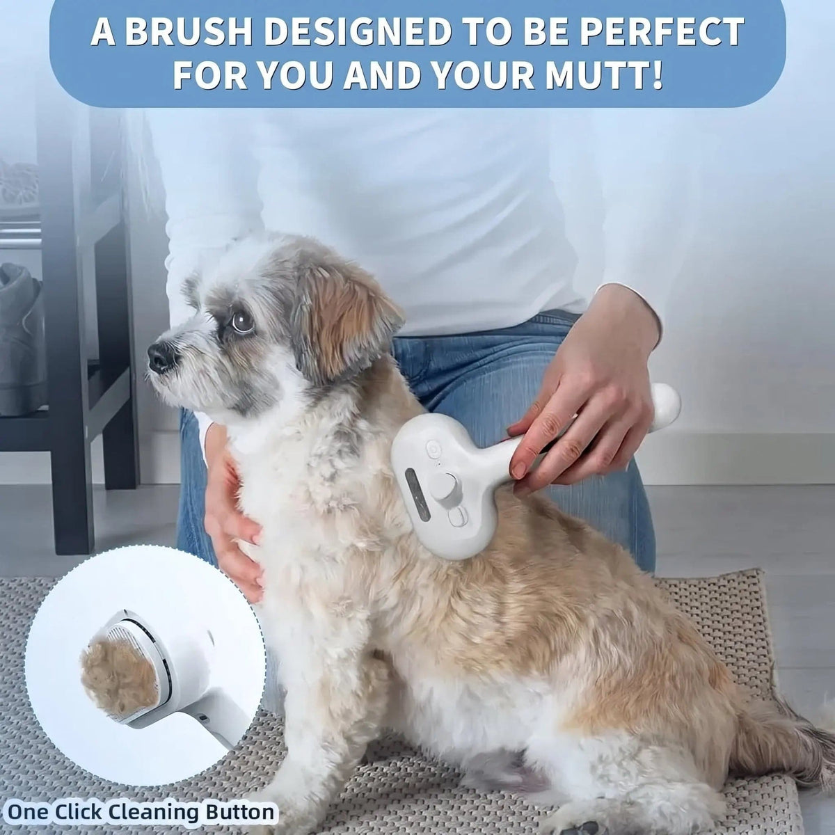 Owner grooming a doodle on a rug with the white self cleaning spray slicker brush.