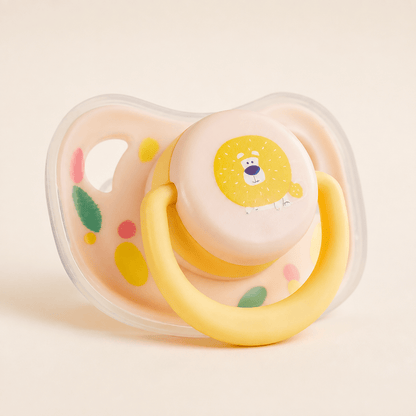 Yellow lion silicone puppy chew toy with a peach shield and a yellow movable ring