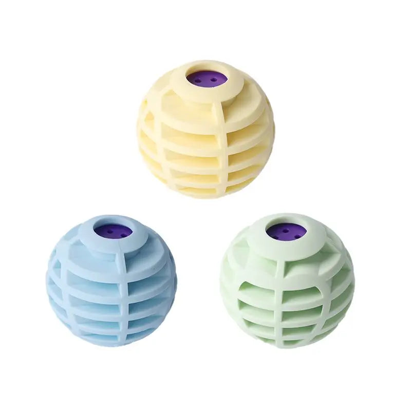 Yellow, blue and green squeaky ball toys for dogs and cats with purple sound modules on a white background.