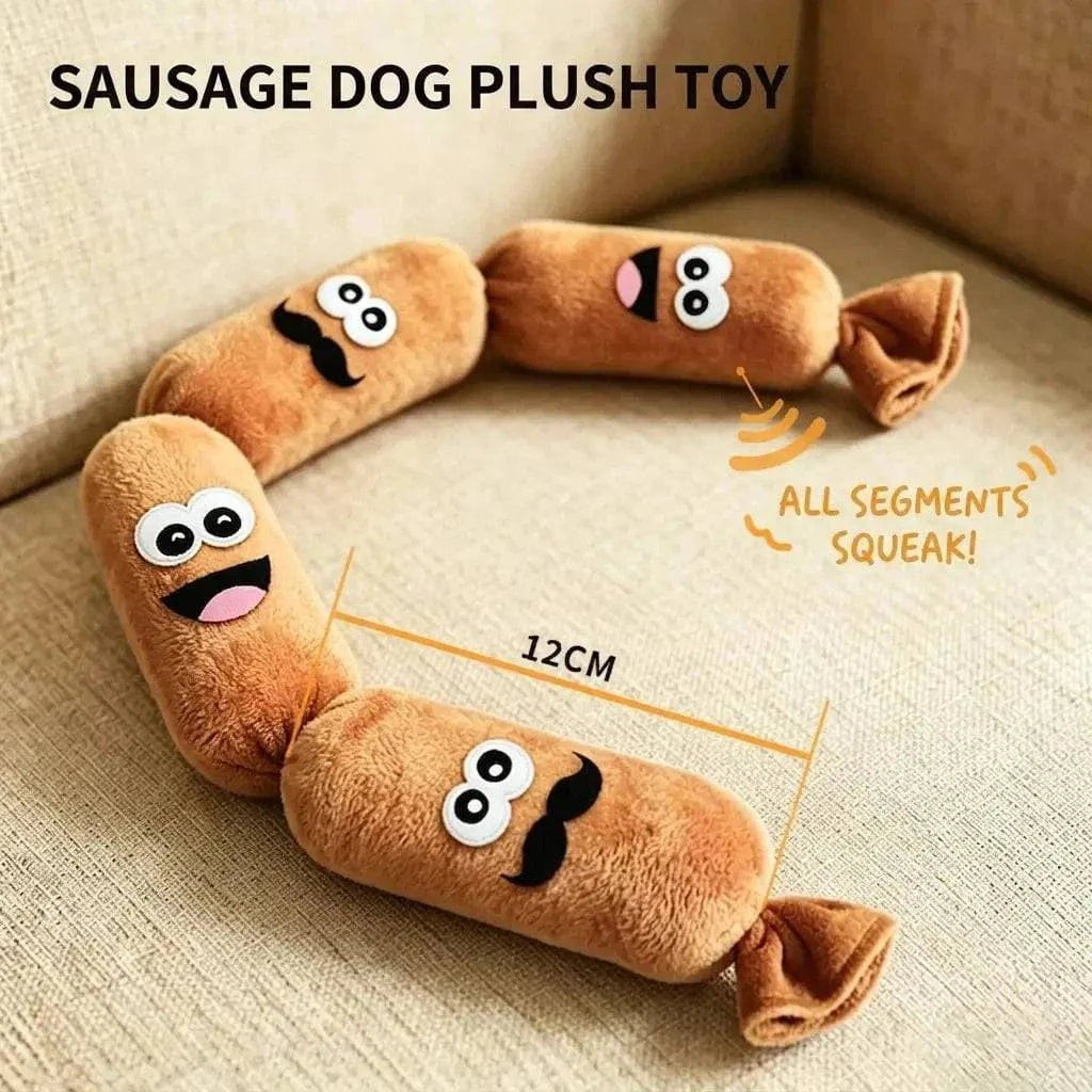 The four link squeaky sausage dog toy with each segment marked twelve centimeters, captioned all segments squeak.