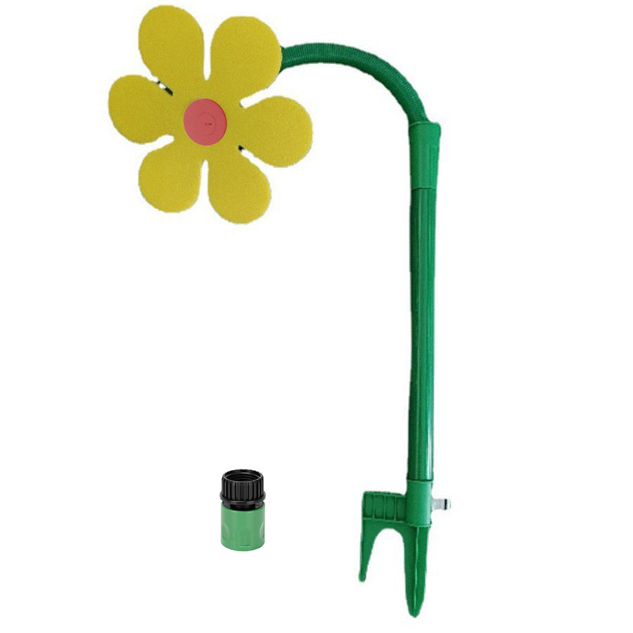 Yellow sunflower sprinkler for dogs on its green stake with the hose connector beside it.