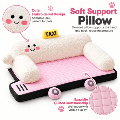 Taxi car shaped pet bed with call-outs of the embroidered smiling face, plush bolster pillow and quilted cushion.