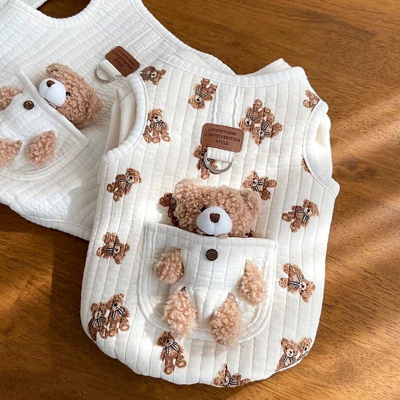 Bear print quilted dog harness vest laid flat with the teddy bear in its pocket