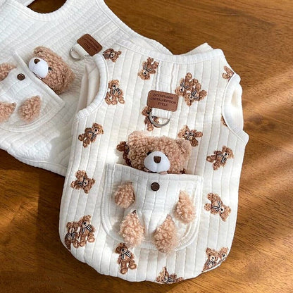 Bear print quilted dog harness vest laid flat with the teddy bear in its pocket