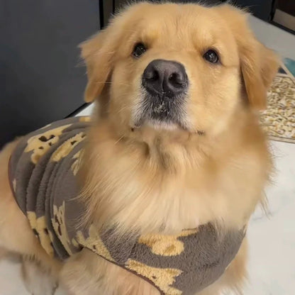 Close view of a golden retriever wearing the brown teddy bear fleece dog vest.
