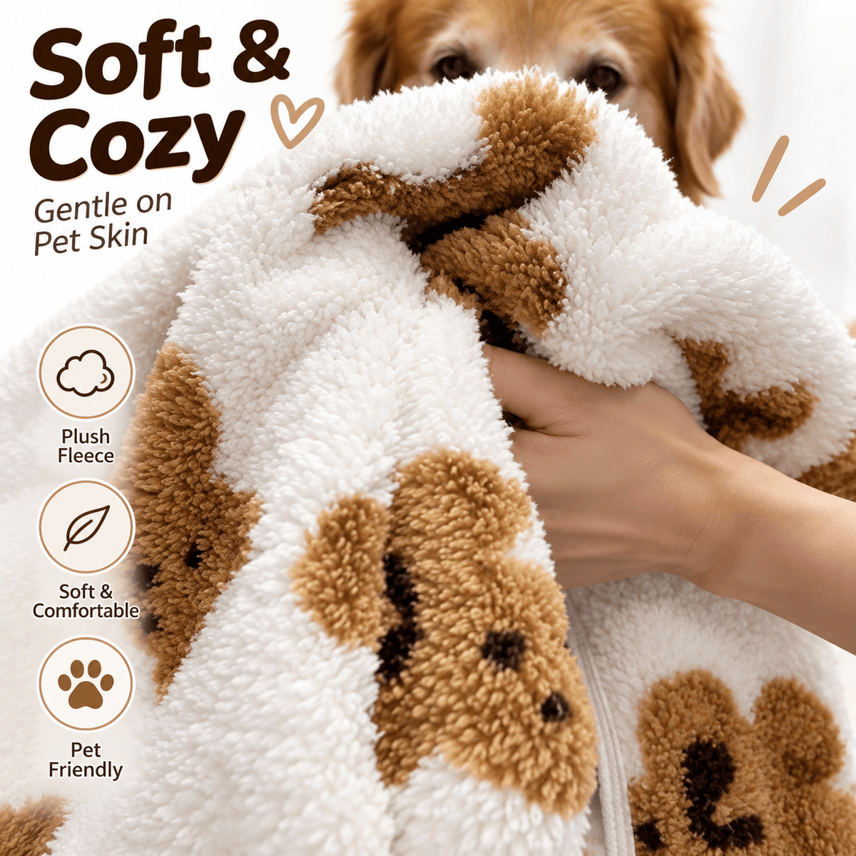 Hand holding the white teddy bear fleece dog vest to show its thick plush fabric up close.