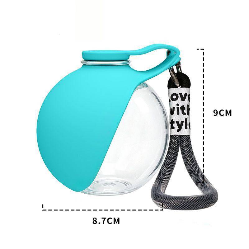 Blue travel dog water bottle with 9 cm height and 8.7 cm width marked and a gray lanyard.