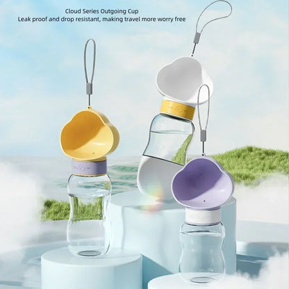 White, yellow and purple travel dog water bottles with cloud-shaped cups, captioned leak proof and drop resistant.