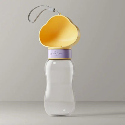 Yellow 600 ml travel dog water bottle with cloud-shaped cup and lanyard.