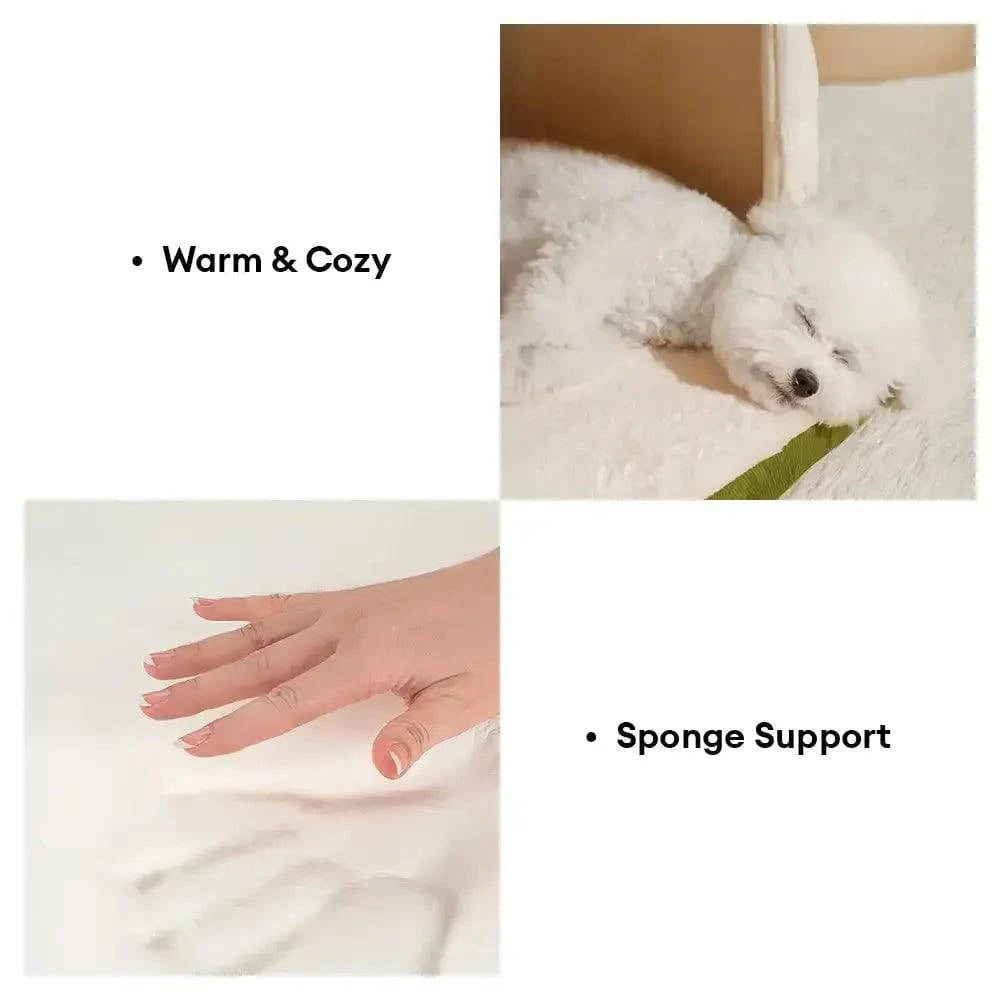 A hand pressing into the sponge base of the cave bed beside a small dog asleep inside it.